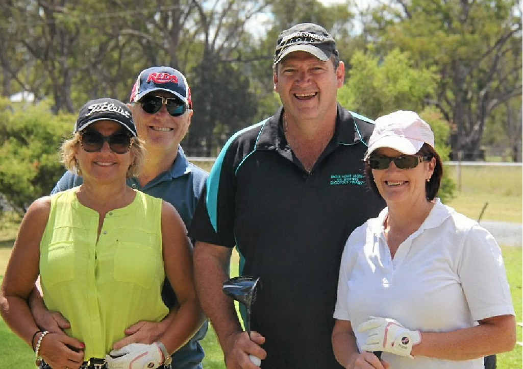 GREAT DAY: Ross and Larissa Hetherington with hole-in-one hitter Ross Bell and his wife Trish Bell at the Warwick Golf Club on Sunday. GREAT DAY: Ross and Larissa Hetherington with hole-in-one hitter Ross Bell and his wife Trish Bell at the Warwick Golf Club on Sunday.